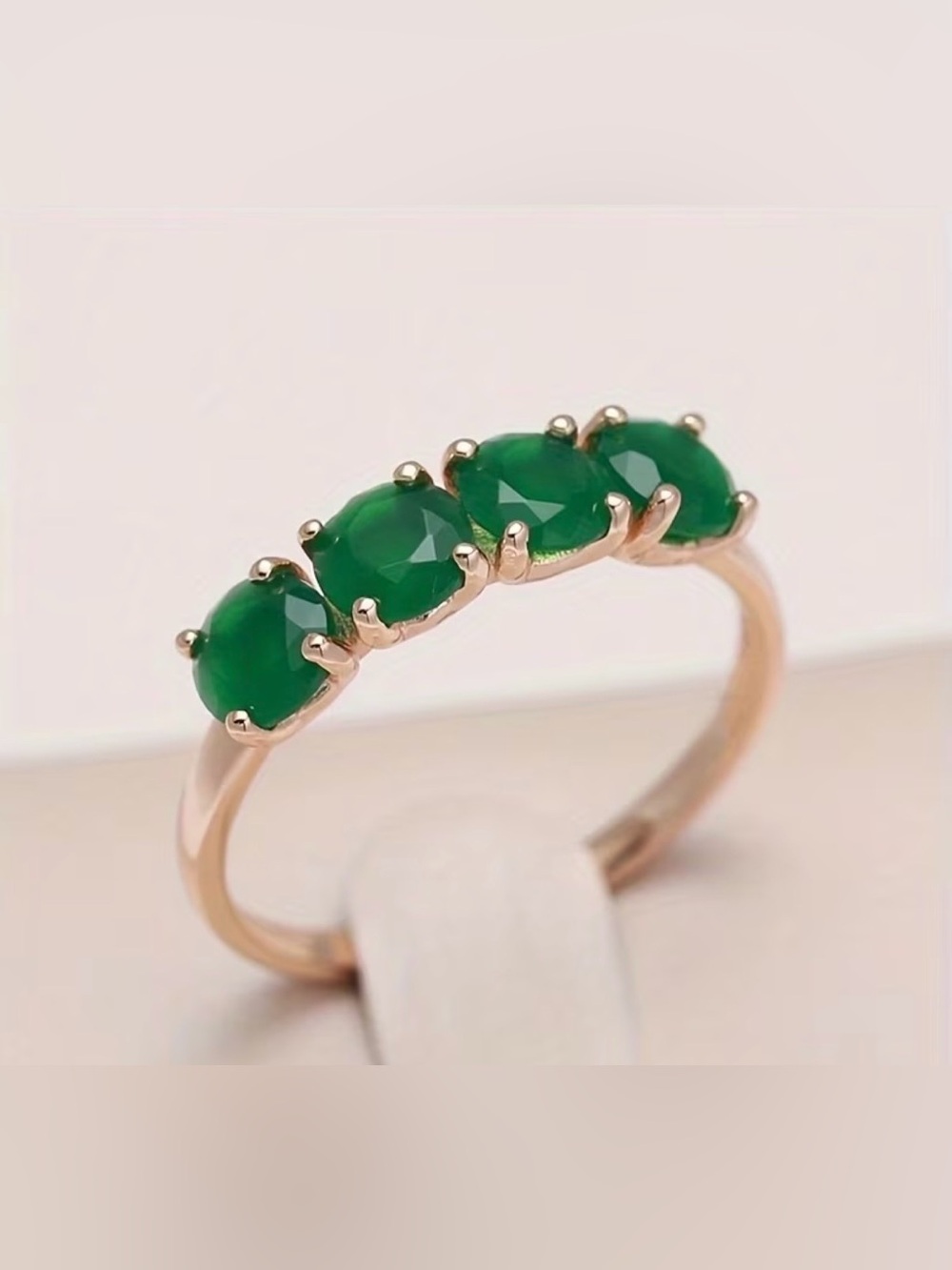 Gold Ring with Green Gemstones - Four-Stone Row